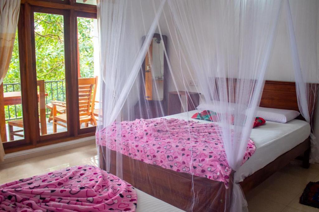 Amado Homestay Ella Esterno foto